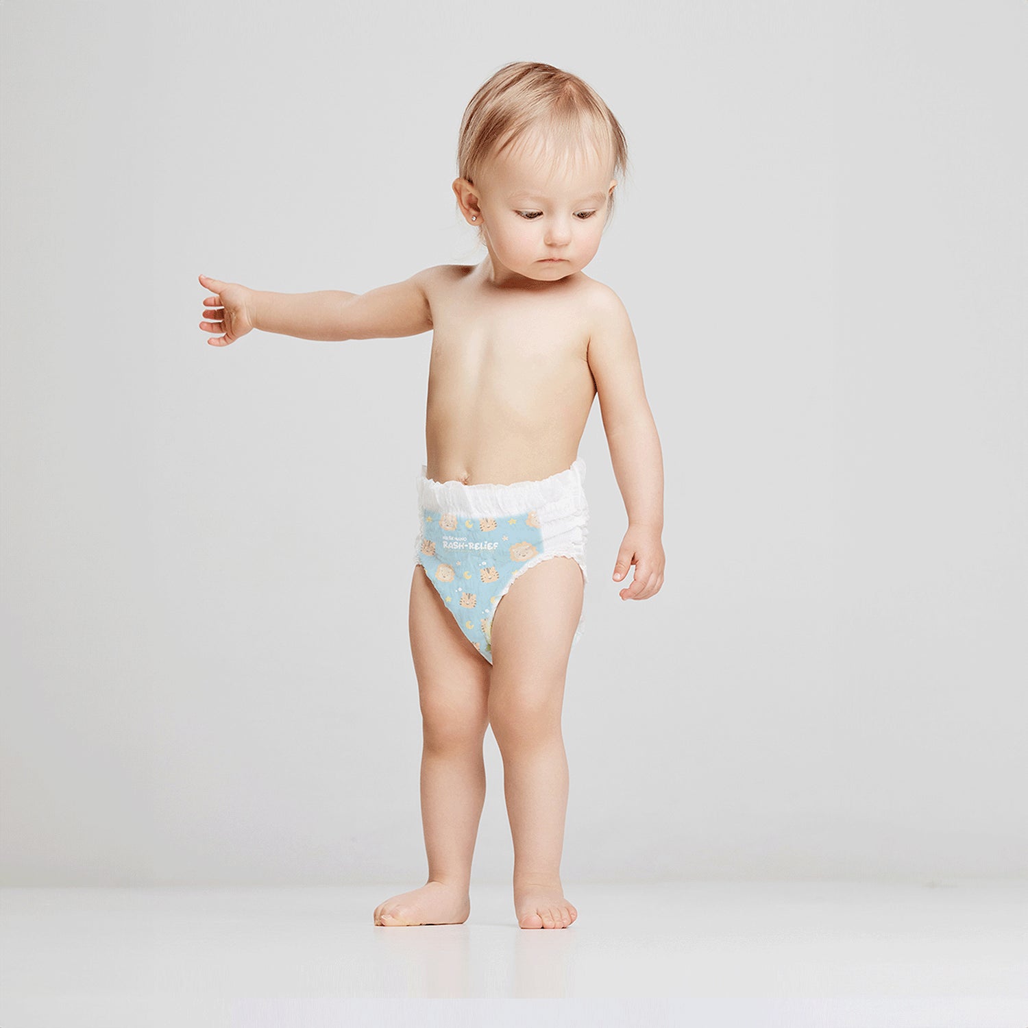 A baby is wearing NASK nanofiber baby pants in XL size