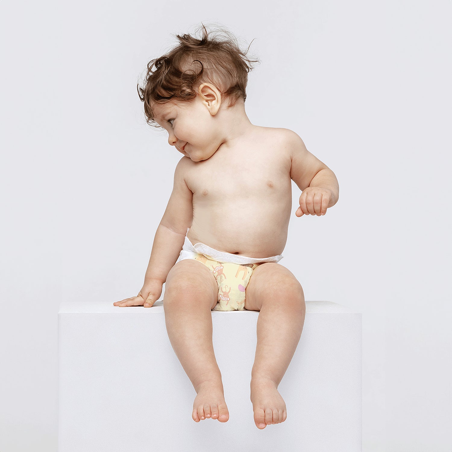 A baby is wearing NASK nanofiber baby pants in XXL size